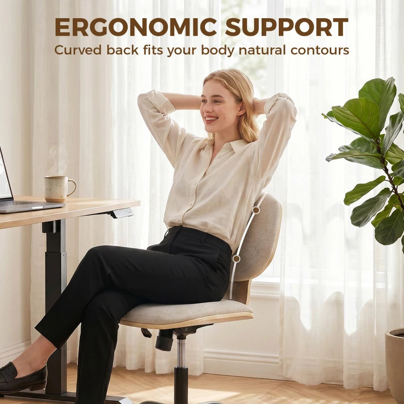 Ergonomic light grey office chair with curved back and upholstered seat, shown in use.