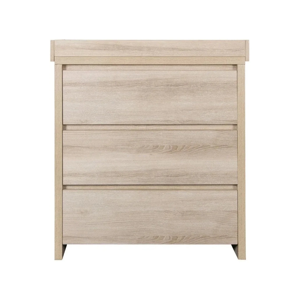 Oak changing unit front view with three horizontal drawers and raised back panel.