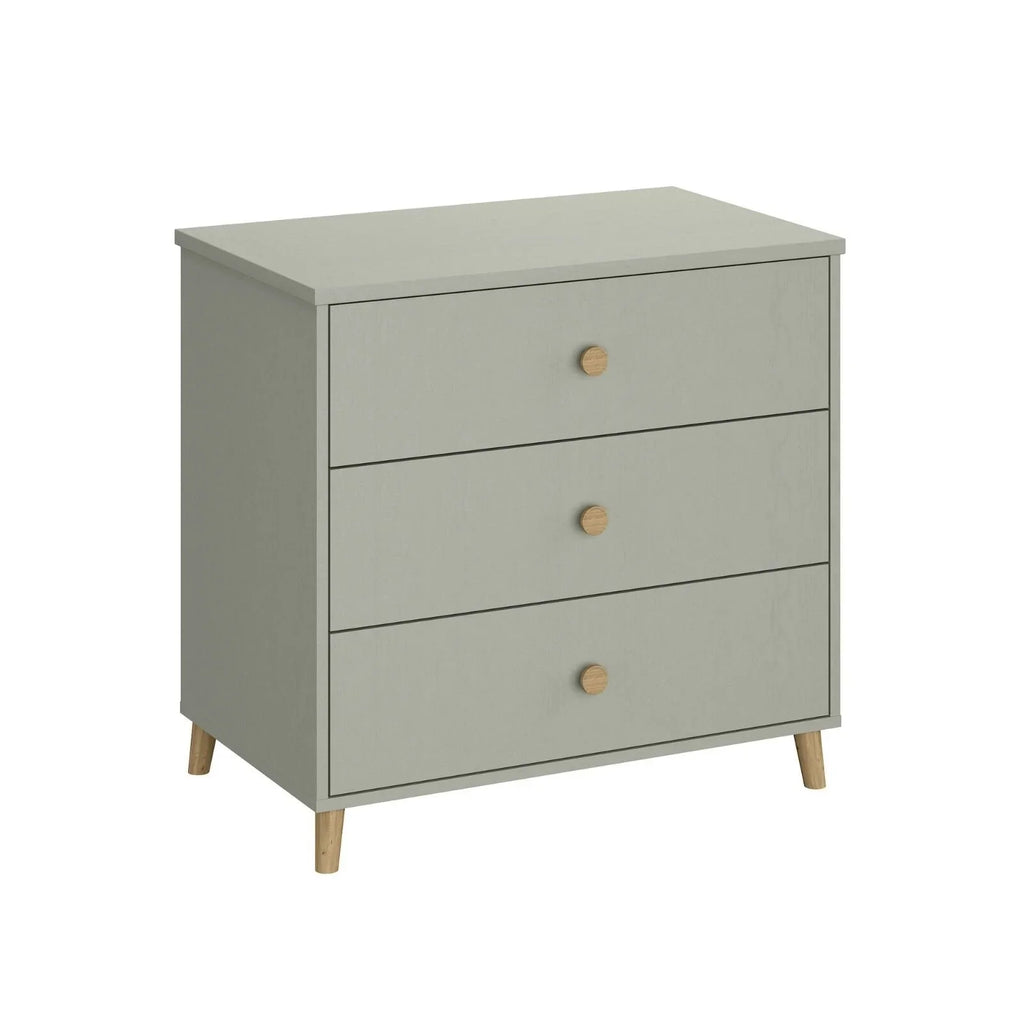 Grey changing dresser for kids with three drawers and brass knobs, angled front view