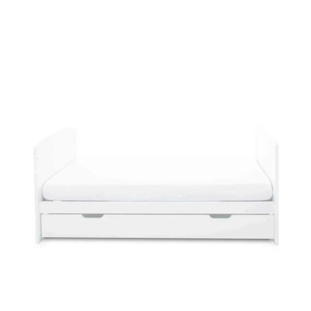 White cot bed with fibre mattress and front rail