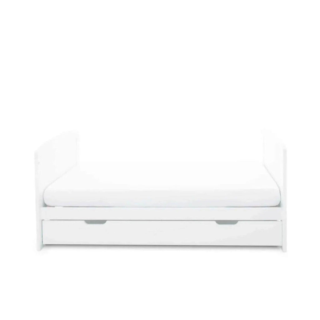 White cot bed with under drawer, open drawer base with inner platform