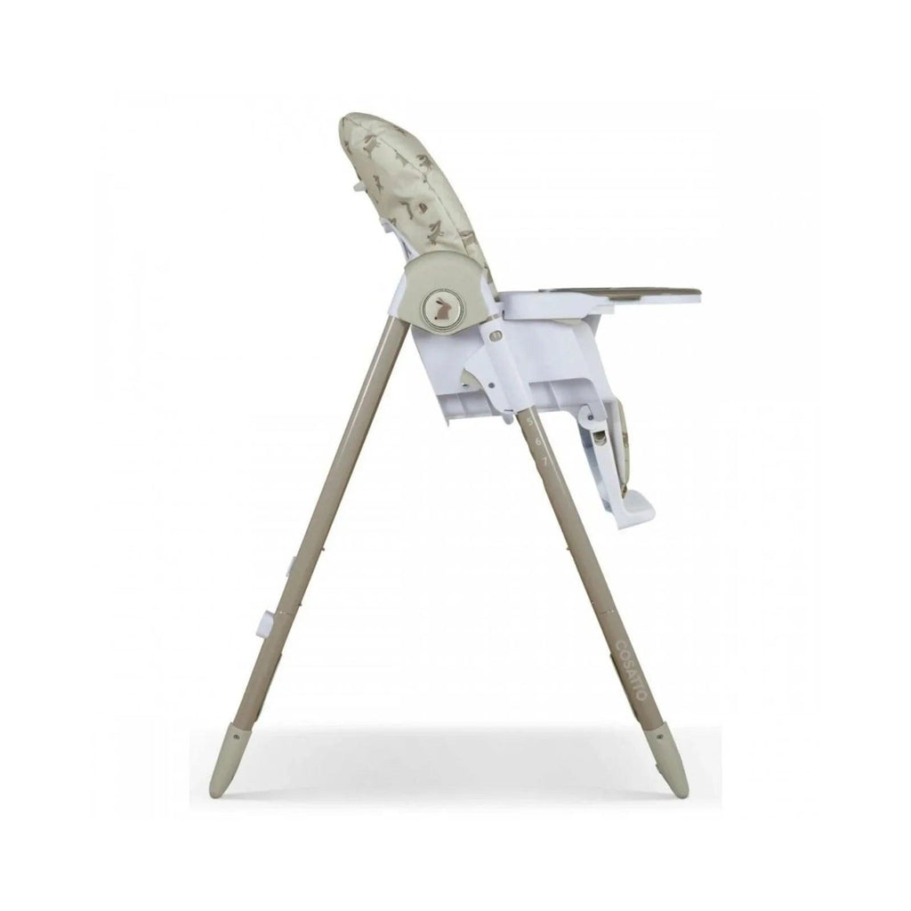 Baby highchair reclined side view with cream animal print headrest and white tray.