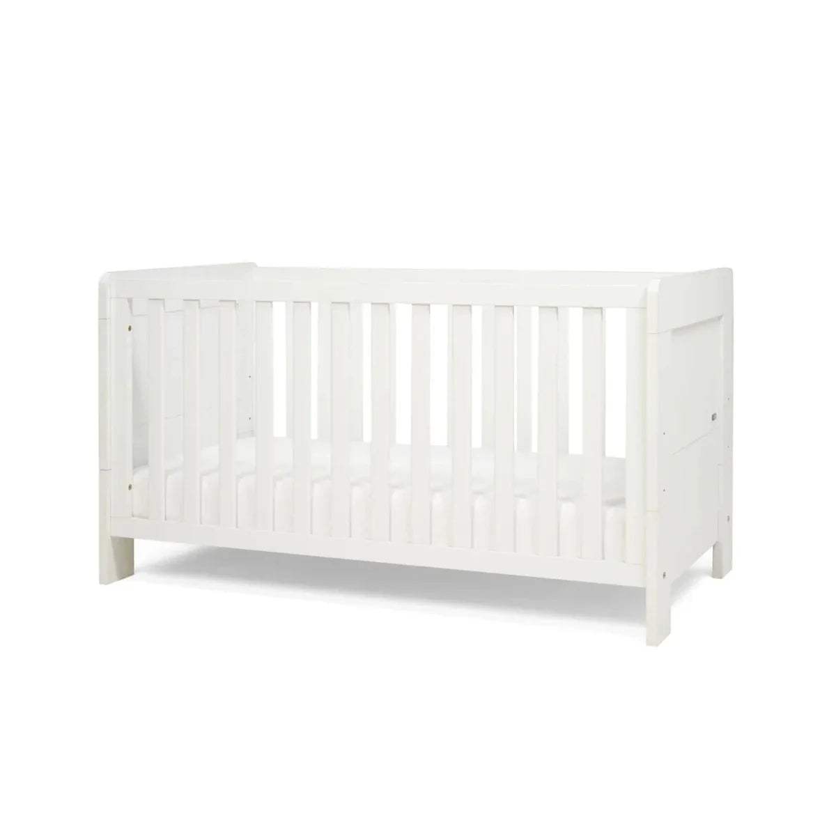 White mini cot bed side view with vertical railings and panel ends