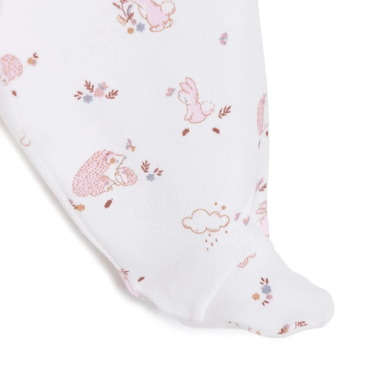 Ecru pajama pants with pink animal and floral prints, shown at the foot