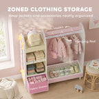 Pink kids wardrobe organizer with side shelves, hanging rod, bottom fabric drawer, and glowing lights.