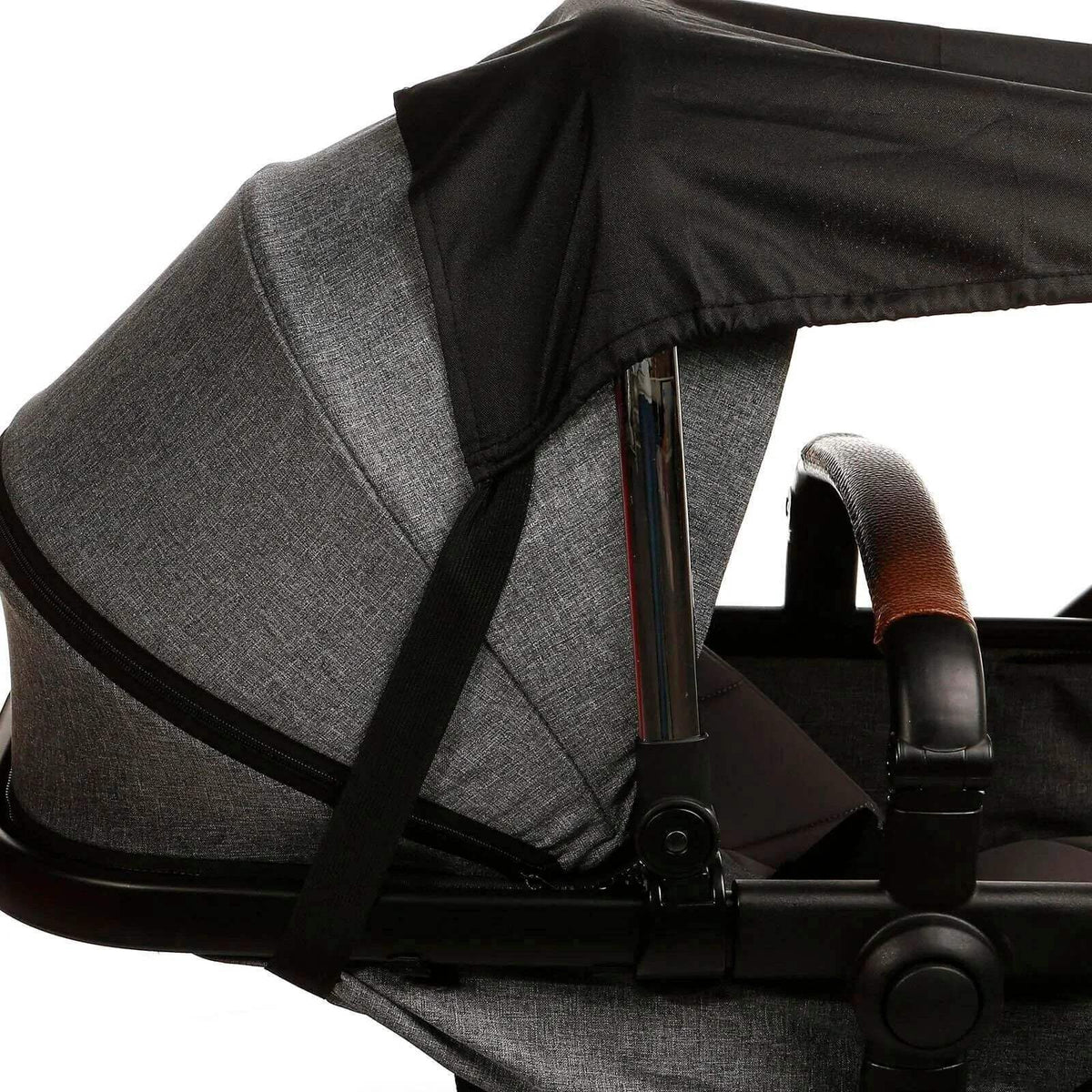 Stroller sunshade with black canopy attached over a gray stroller seat