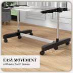 Black clothes drying rack on six wheels, two with brakes for easy movement
