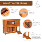 Two-tier wooden guinea pig hutch with wire mesh doors and a lower ramp platform.