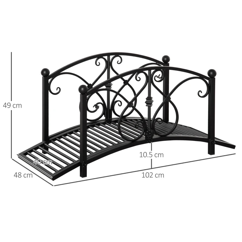 Black metal arched footbridge with safety rails and slatted deck; size diagram view