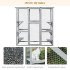 Light grey wooden cat outdoor enclosure with wire mesh panels and elevated steps for cats.