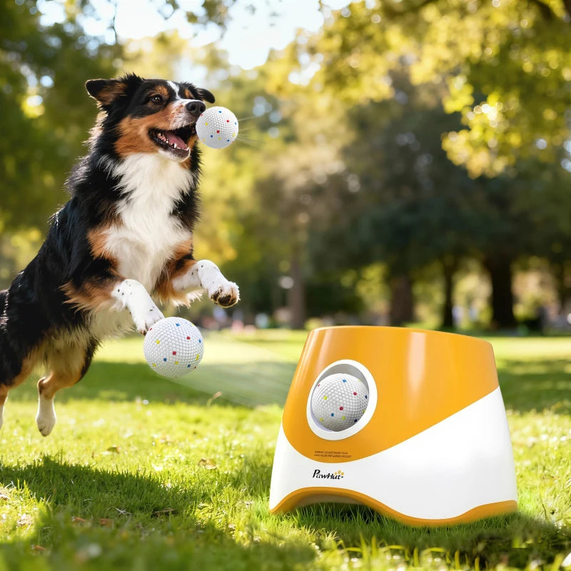 White textured dog ball with colorful dots mid-throw for fetch
