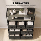 Grey wood-effect dresser with open shelf top and six front fabric drawers