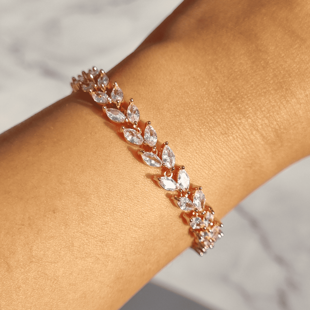 Marquise-cut petal bracelet with oval marquise stones, bracelet cuff detail, rose-gold tone.