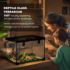 Black glass terrarium enclosure with black top cover, thermometer, and green habitat