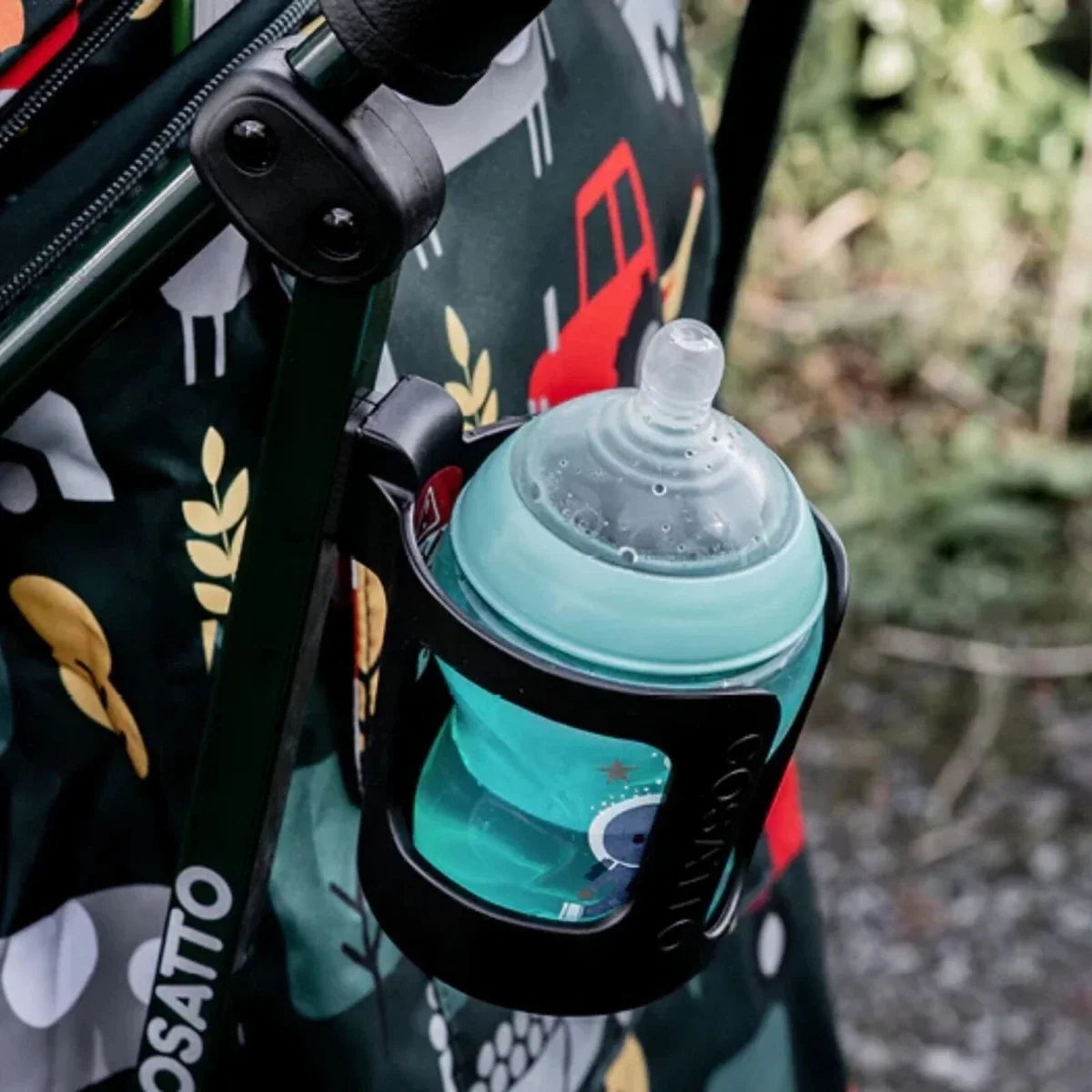 Stroller cup holder with clear water bottle and lid