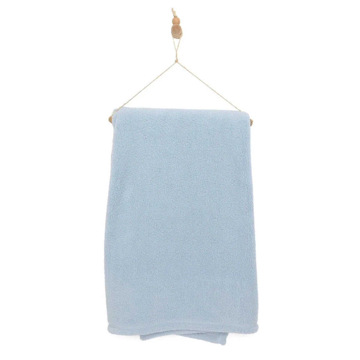 Blue sherpa fleece baby blanket on hanging cord