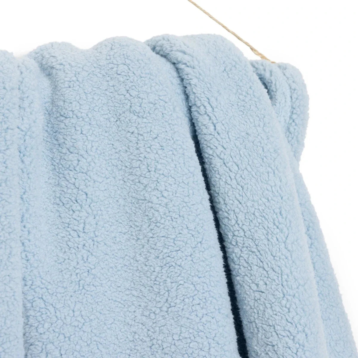 Blue sherpa fleece baby blanket with thick folded seam