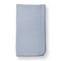 Blue waffle-knit baby blanket with stitched edge, folded into a rectangle