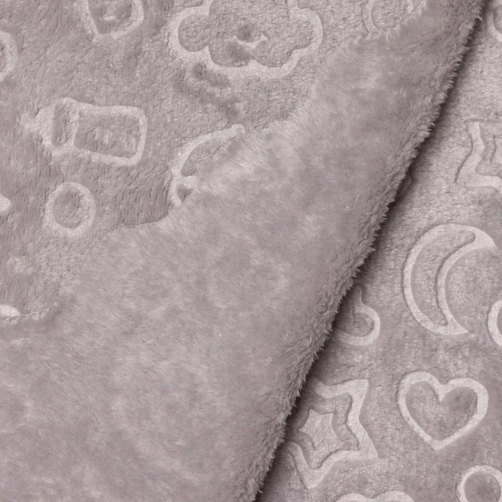 Grey baby blanket close-up showing plush fleece underside and patterned side