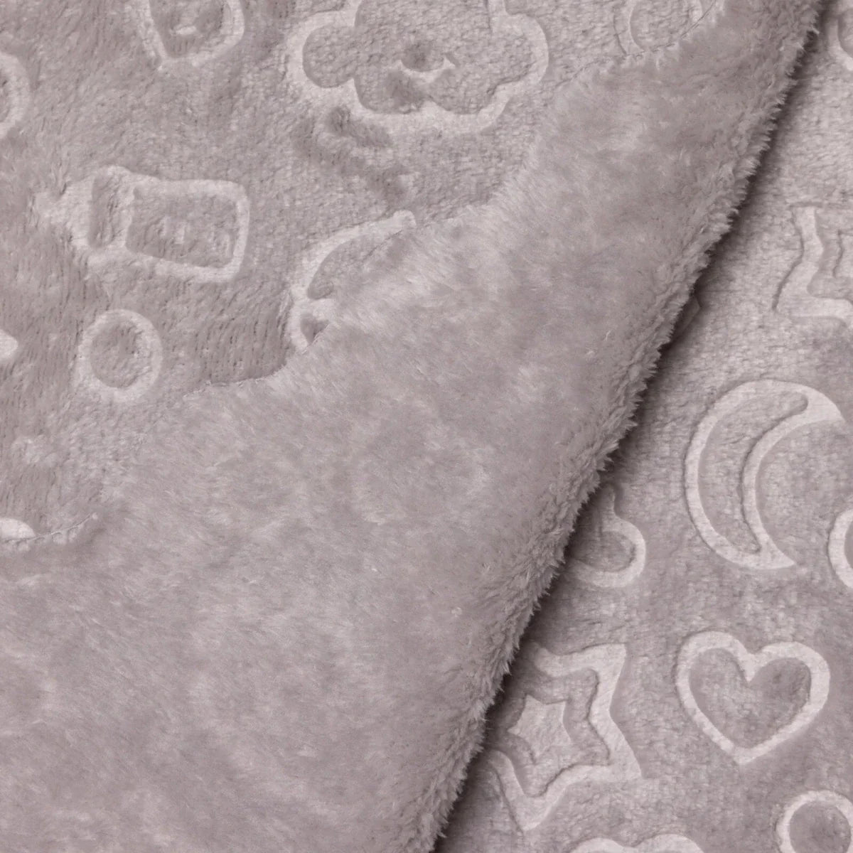 Grey baby blanket close-up showing plush fleece underside and patterned side