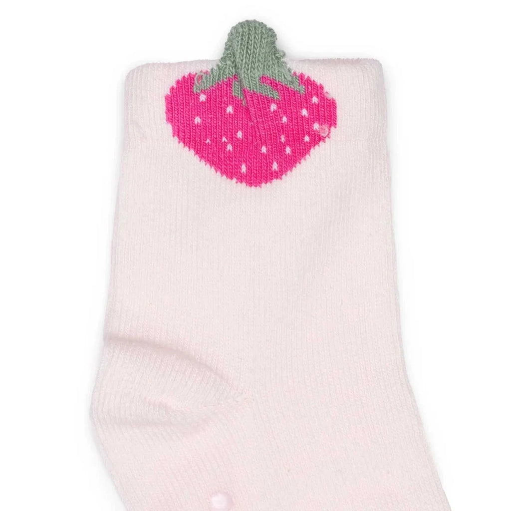 Pink girls non-slip sock with ribbed gray cuff and large strawberry graphic on top.