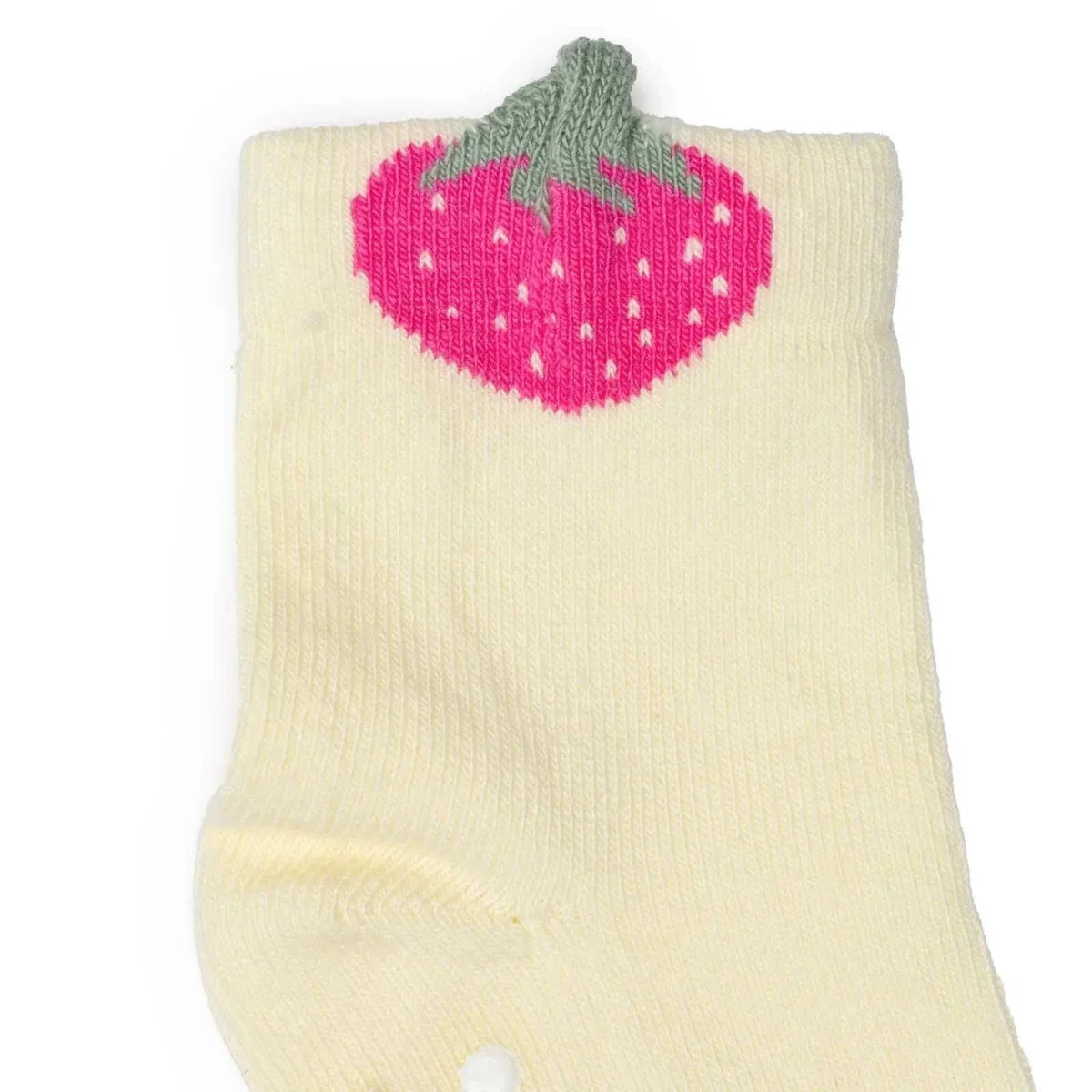 Cream girls non-slip sock with ribbed gray cuff and pink strawberry graphic on top.