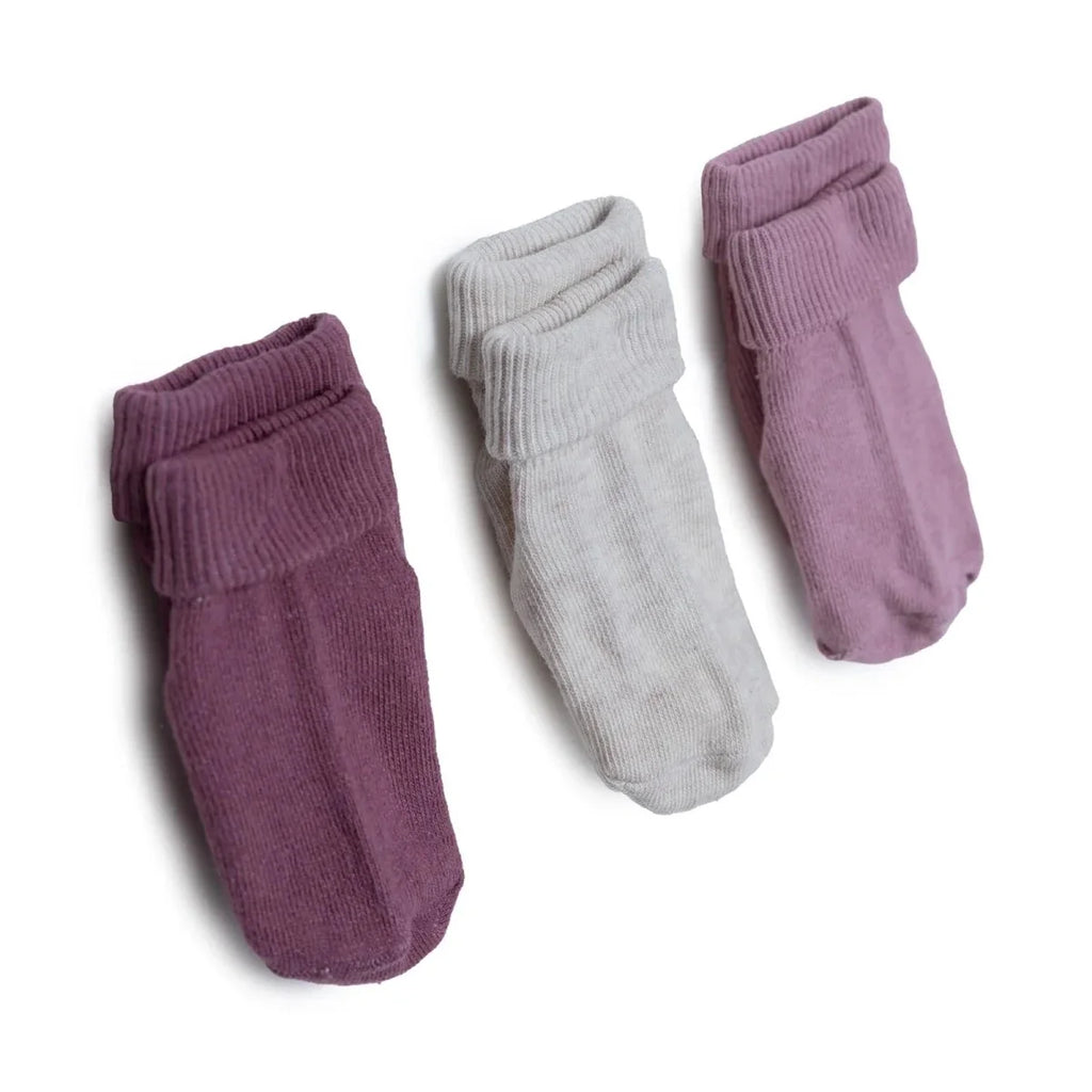 Pack of roll-top baby socks: dark purple, white, and light purple, ribbed cuffs
