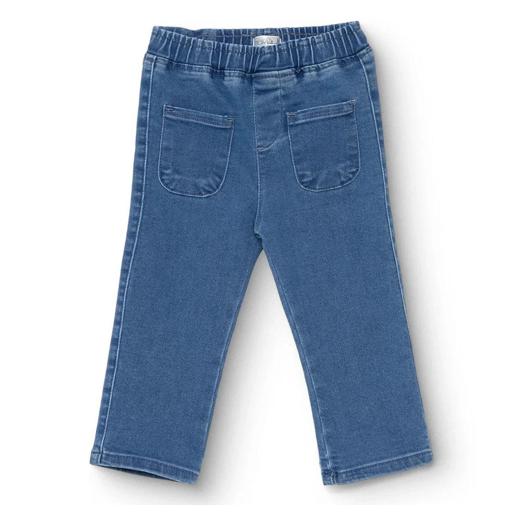 Indigo denim baby trousers with elastic waist and two front patch pockets