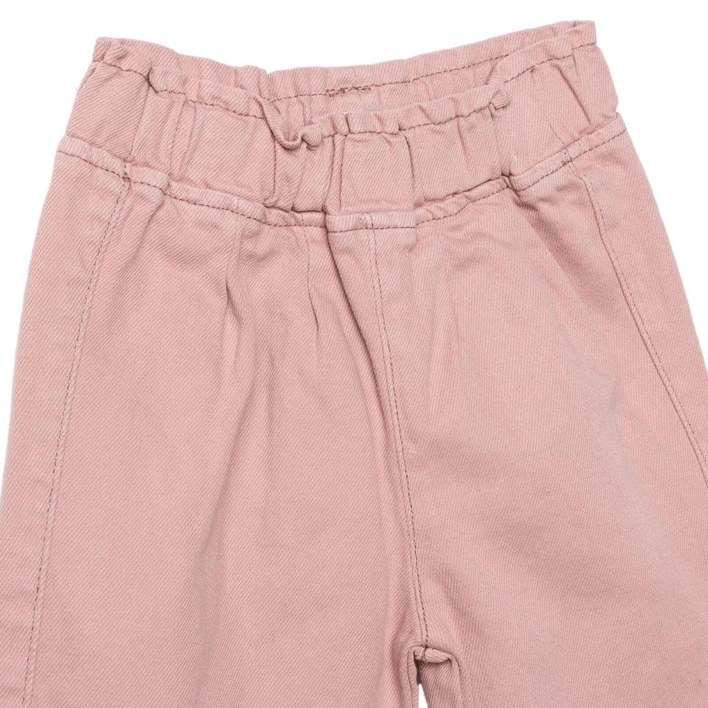 Pink baby trousers close-up of elastic waist and inner waistband tie