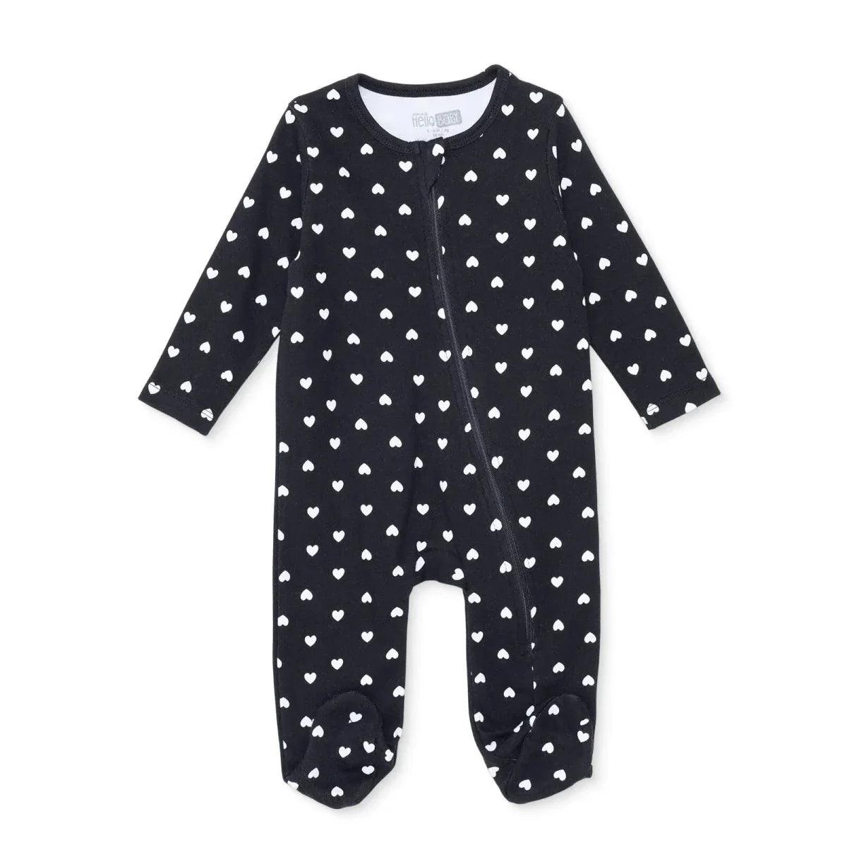 Black long-sleeve baby sleepsuit with feet, allover white heart print, front zipper