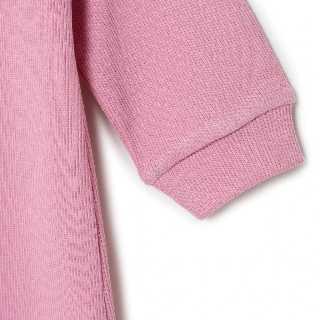 Pink ribbed baby sleepsuit sleeve cuff with elastic hem
