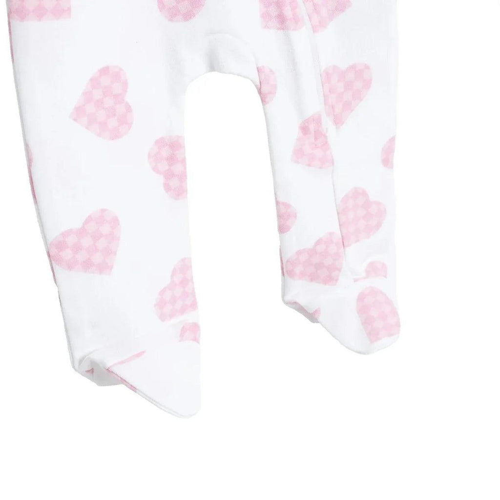 Footed legs and ankle cuffs, white with pink heart print baby sleepsuit