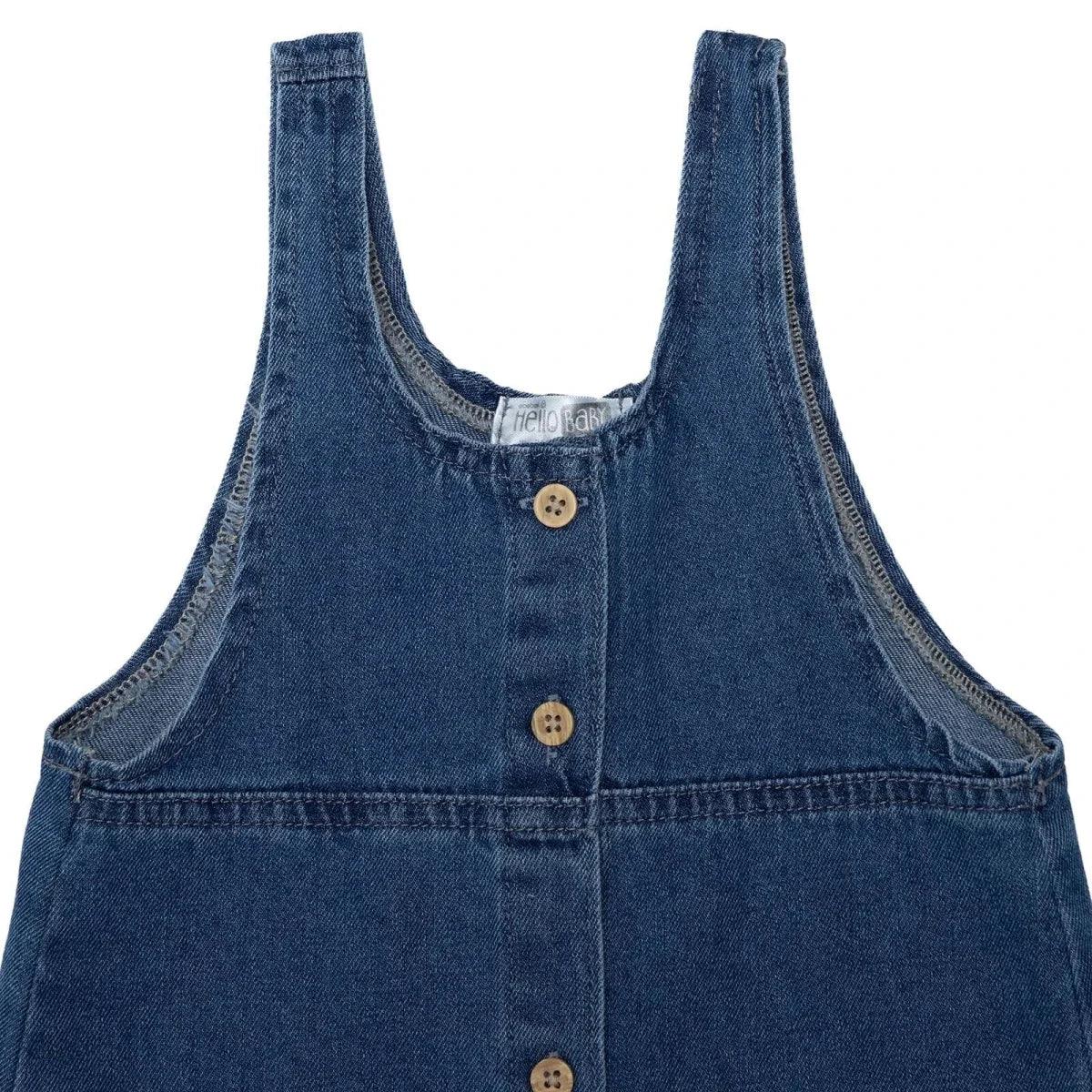 Indigo denim pinafore bib with three wooden-look buttons and contrast stitch trim