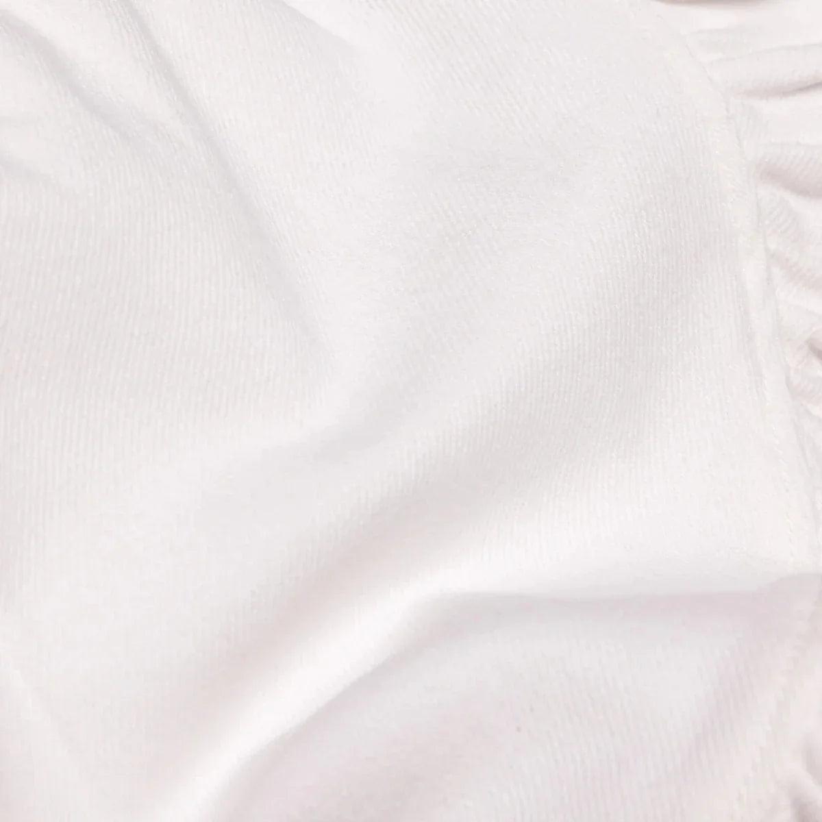 Close-up of ecru fabric for plain baby skort