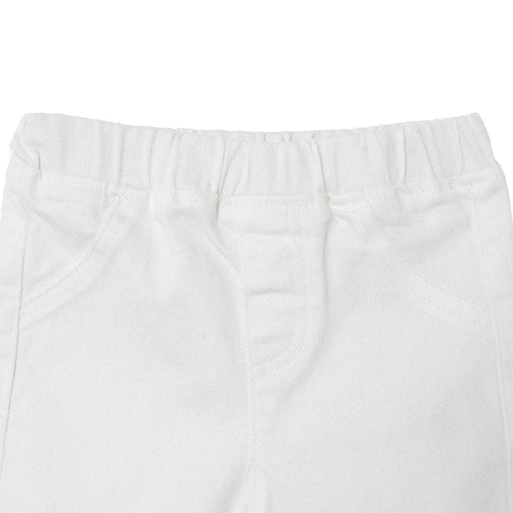 Ecru denim baby shorts with elastic waistband and stitched front seams