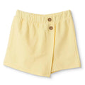 Yellow baby skort with button front and elastic waistband