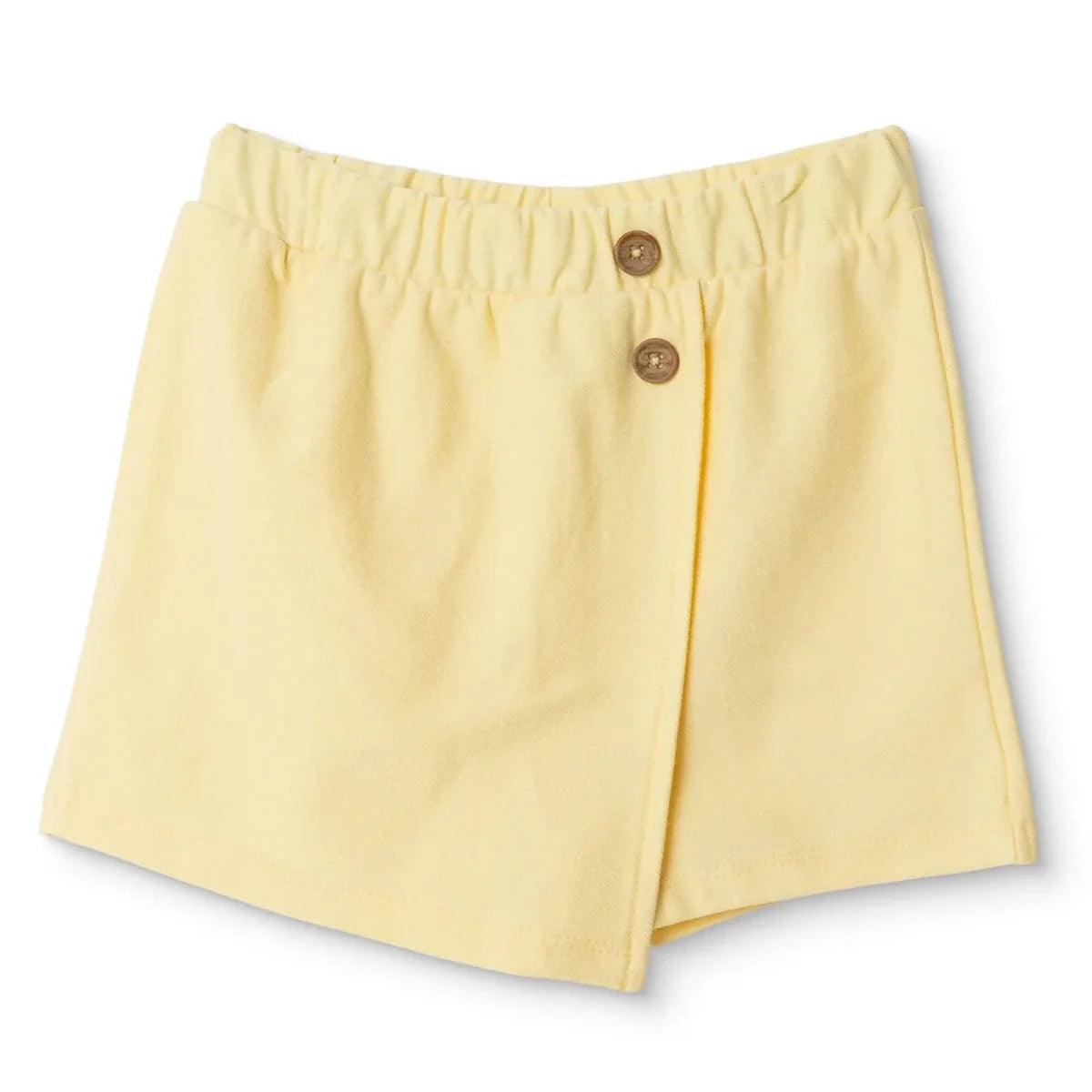 Yellow baby skort with button front and elastic waistband