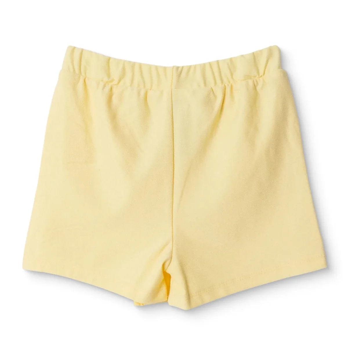 Yellow baby skort with elastic waistband and straight leg silhouette