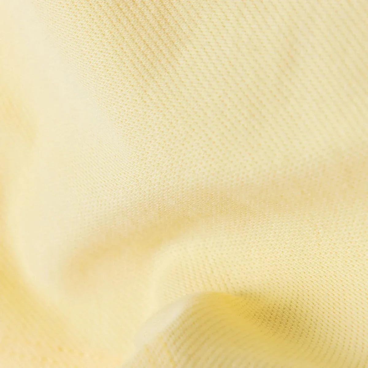 Yellow baby skort fabric texture close-up