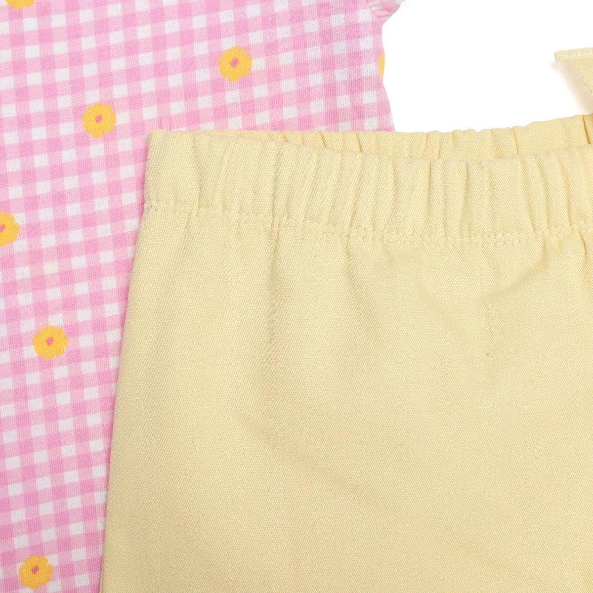 Pale yellow baby shorts with elastic waistband