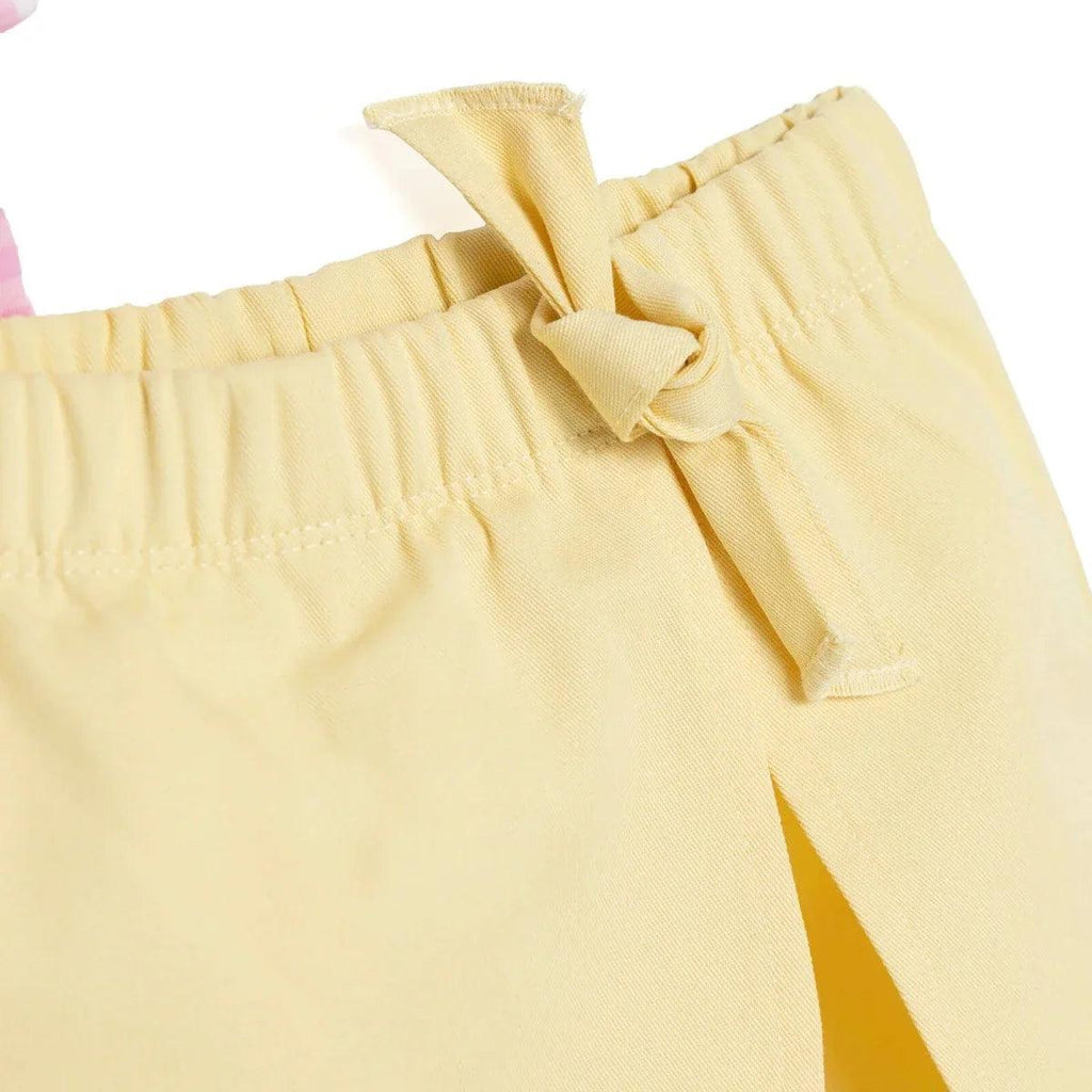 Pale yellow baby shorts with bow-tied elastic waist