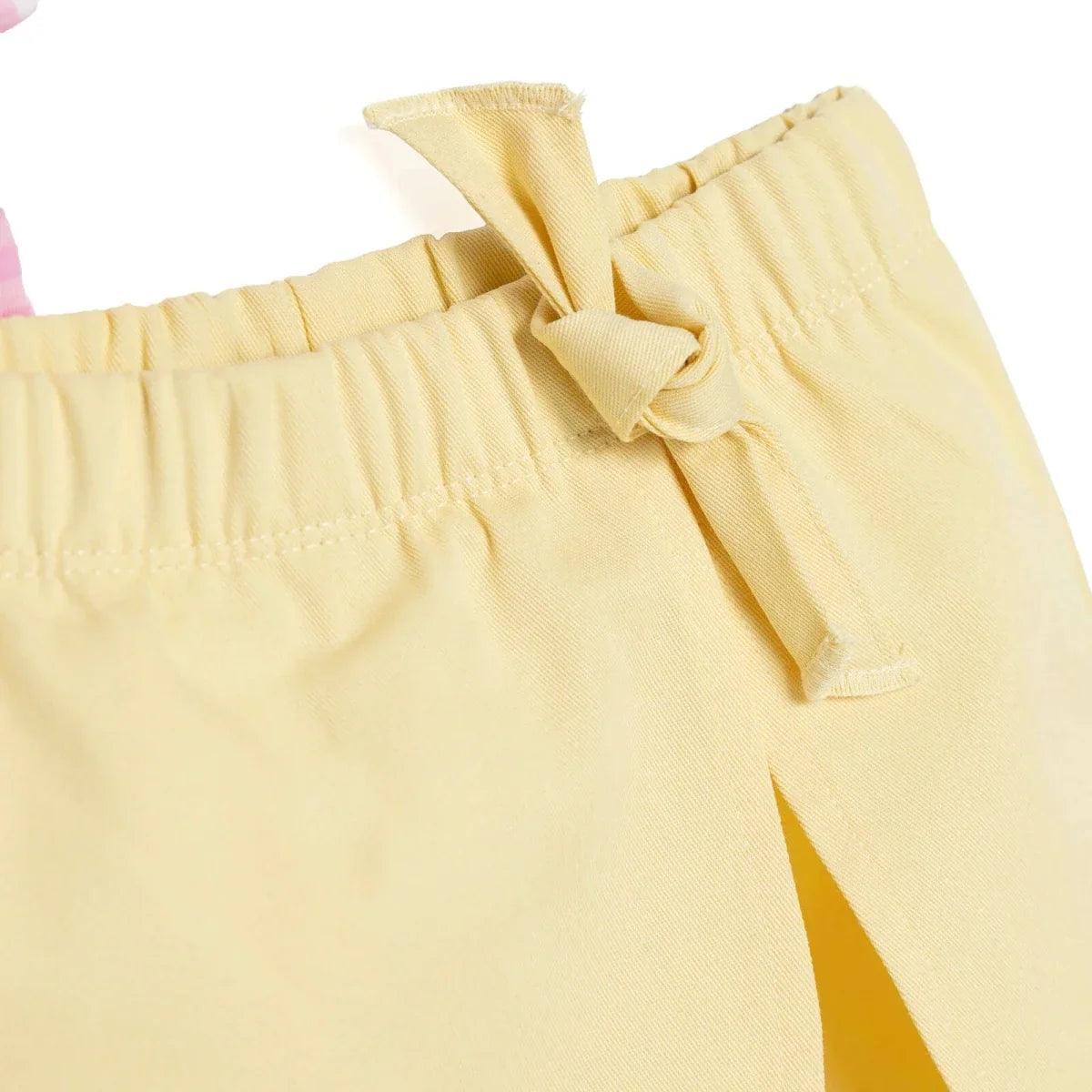 Pale yellow baby shorts with bow-tied elastic waist