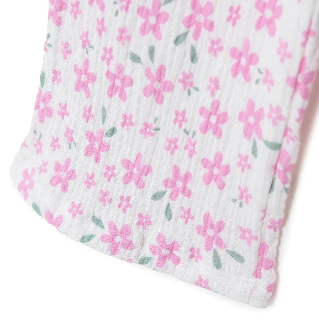 Pink flower print trousers with gathered fabric and elastic cuff bottom