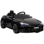 Black licensed kids electric ride-on car, front three-quarter view with LED headlights