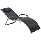 Black reclining sun lounger chair with padded headrest and curved aluminium frame