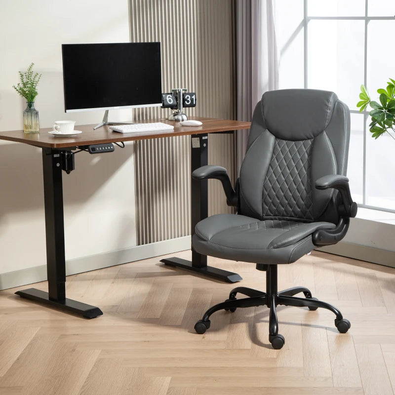 Charcoal grey office chair with quilted high back, padded seat, and wheeled base