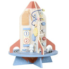 Isolated rocket-themed wooden activity cube toy with bead maze, gears, and number tiles