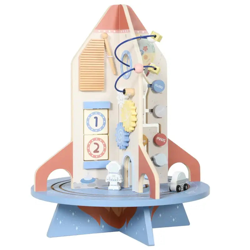 Isolated rocket-themed wooden activity cube toy with bead maze, gears, and number tiles