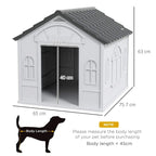 Grey plastic dog house with front door; 65 cm wide, 75.7 cm deep, 63 cm high
