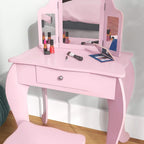 Pink kids vanity table with tri-fold mirror, drawer, and tabletop with accessories